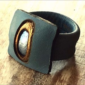 Light & metallic blue with bronze leather ring